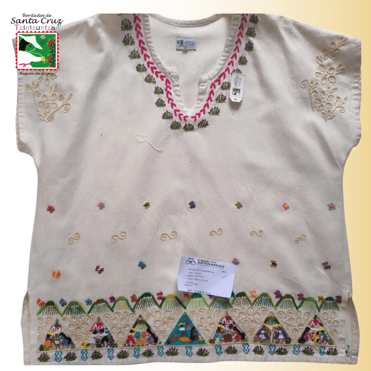 Blusa tradicional bordada con cenefa de triángulos